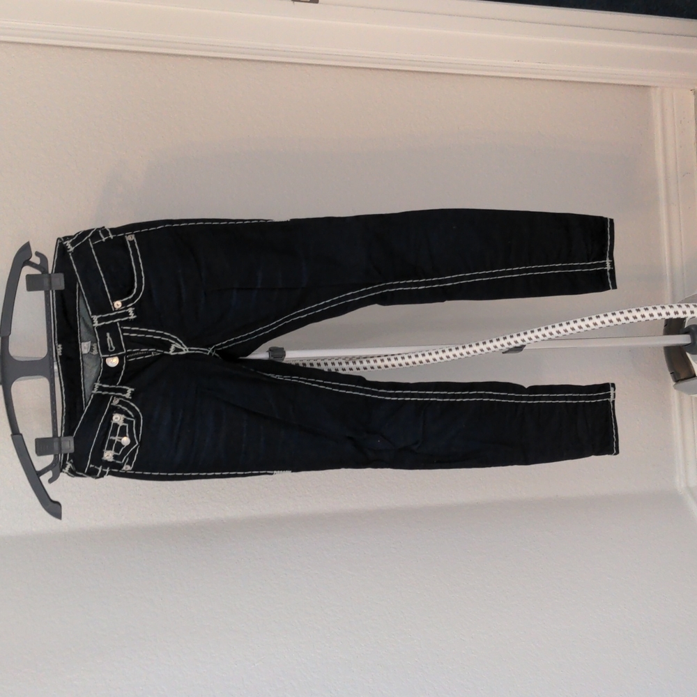 True Religion dark wash straight leg jeans with white stitching. Size 27